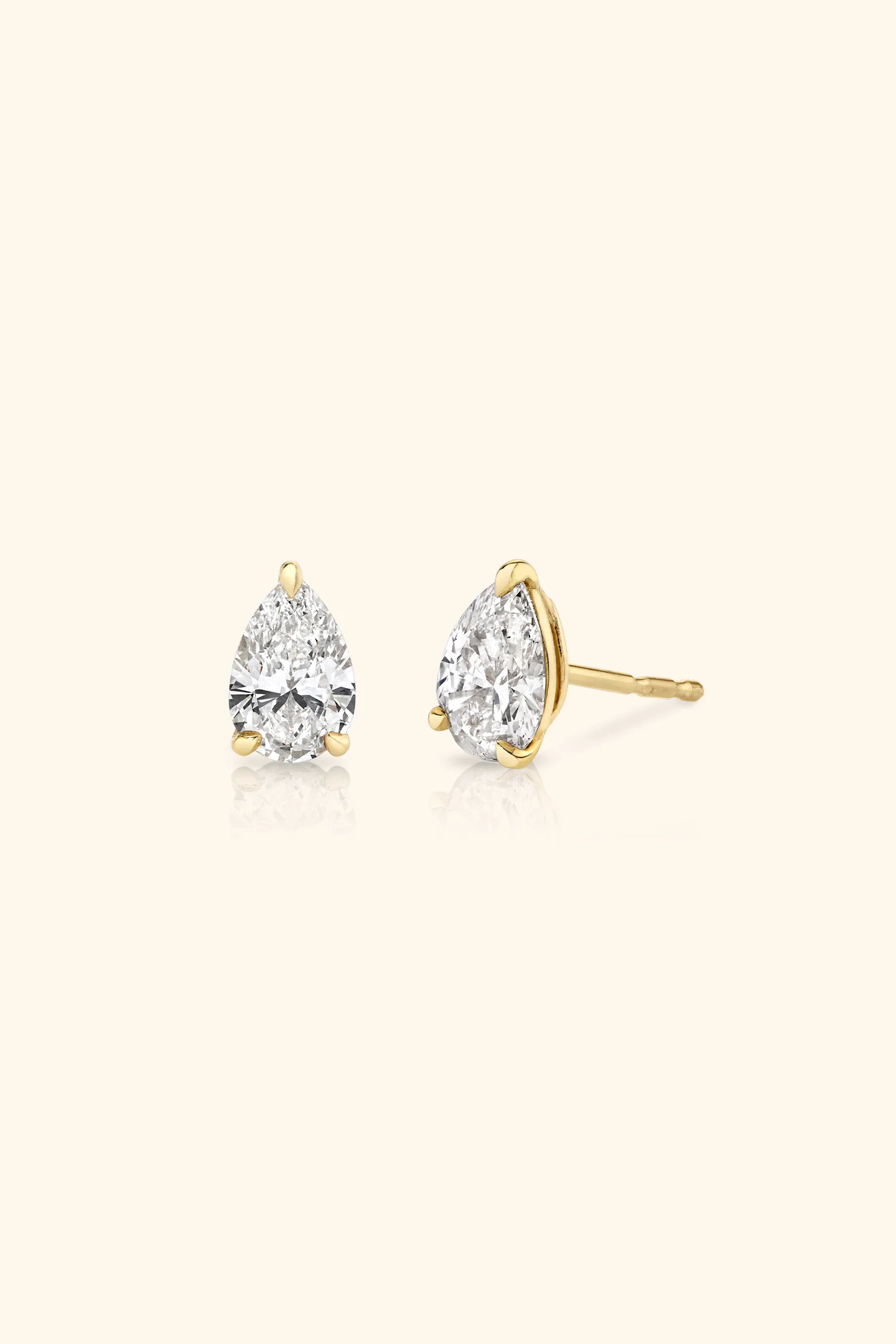 Classic Diamond Studs set with Pear Solitaire - Image 10