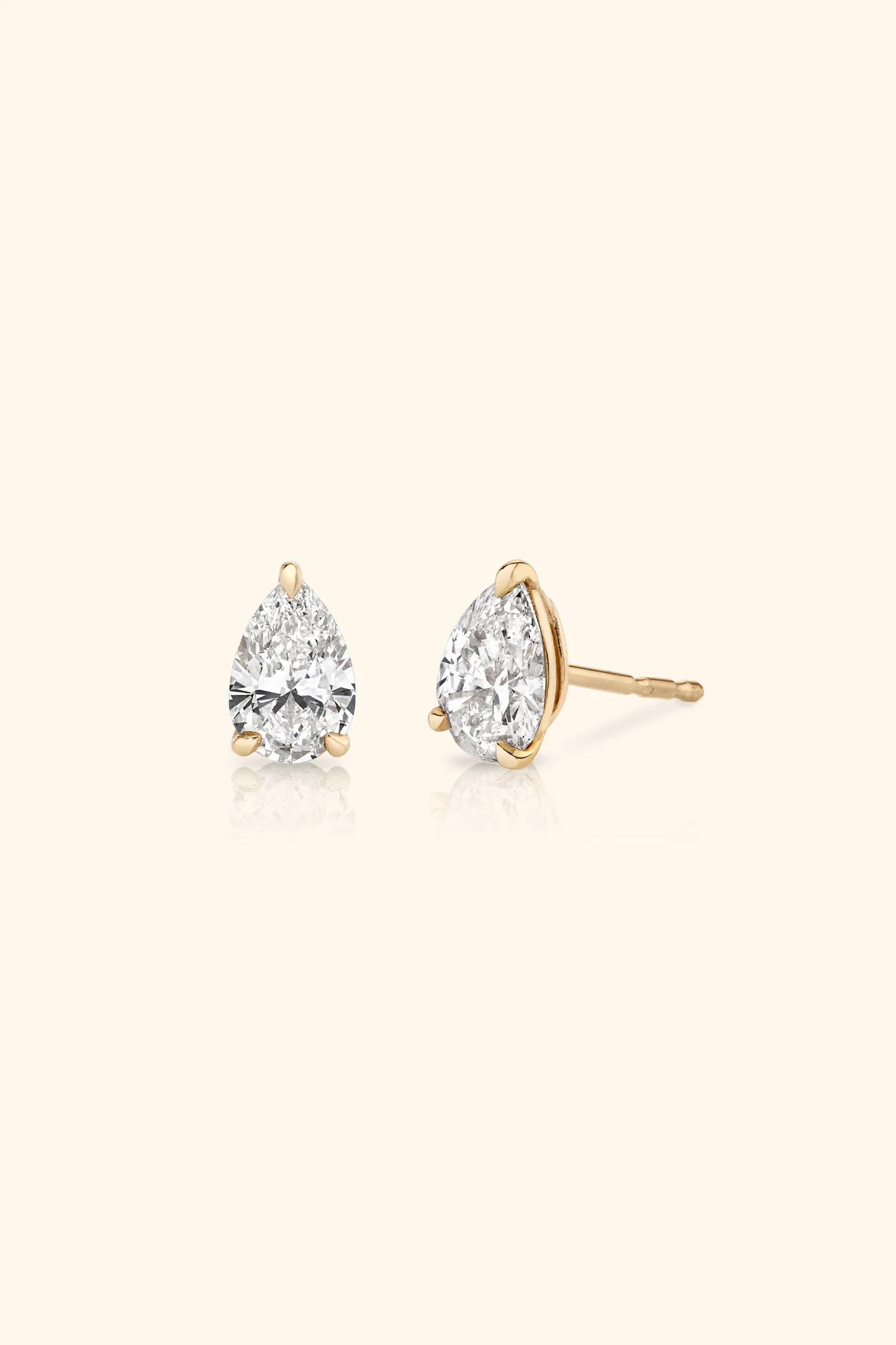Classic Diamond Studs set with Pear Solitaire - Image 3