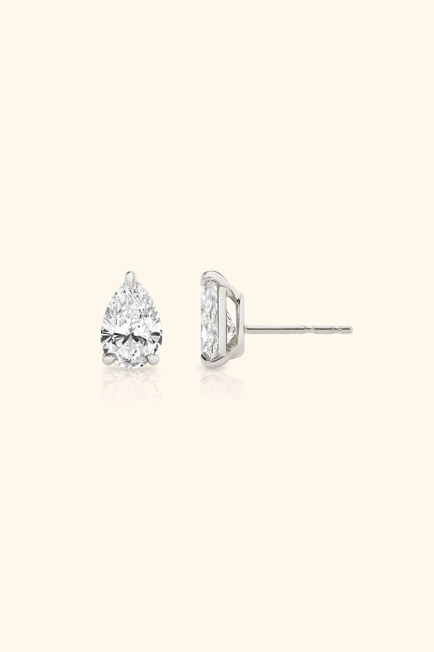 Classic Diamond Studs set with Pear Solitaire - Image 6