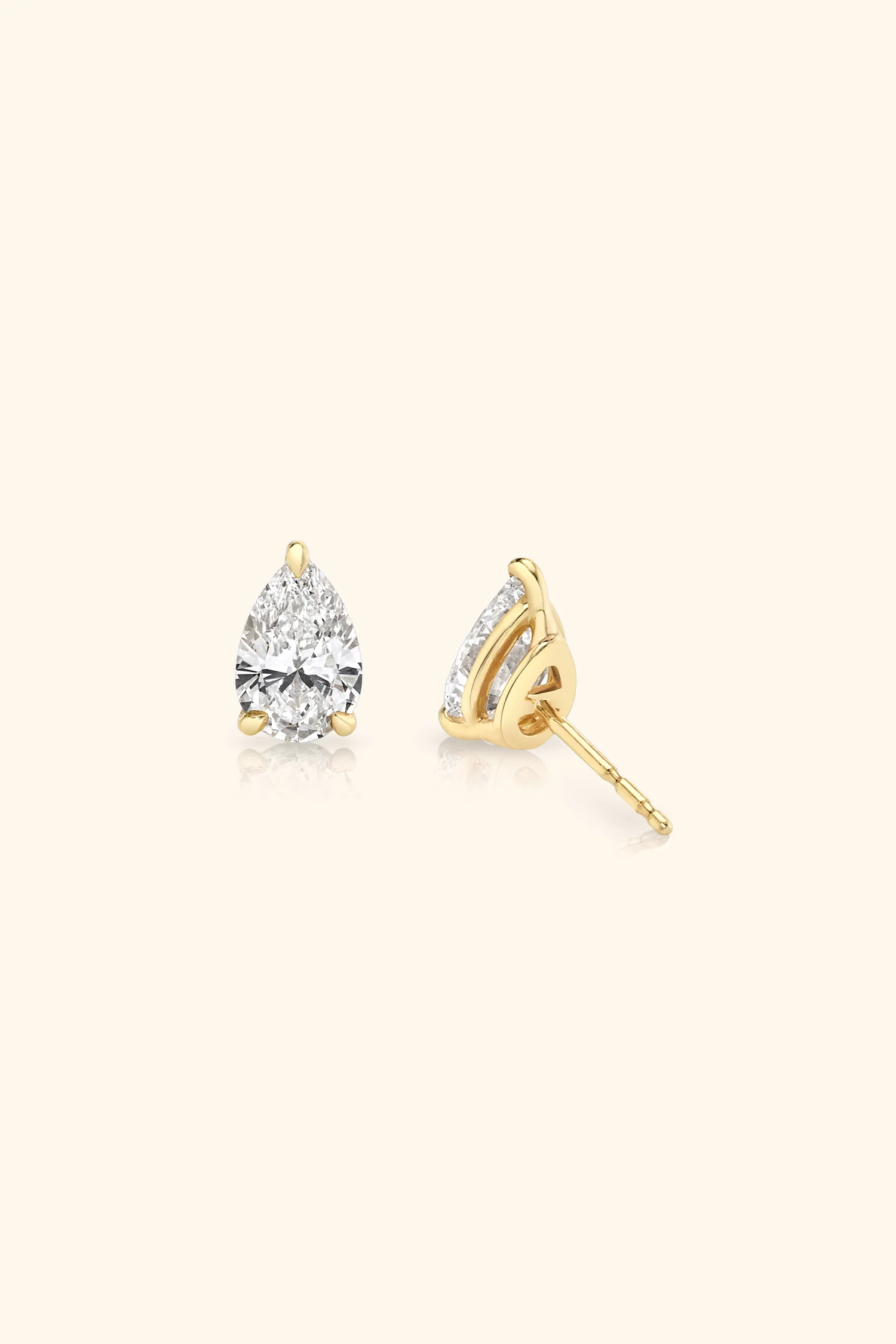 Classic Diamond Studs set with Pear Solitaire - Image 8