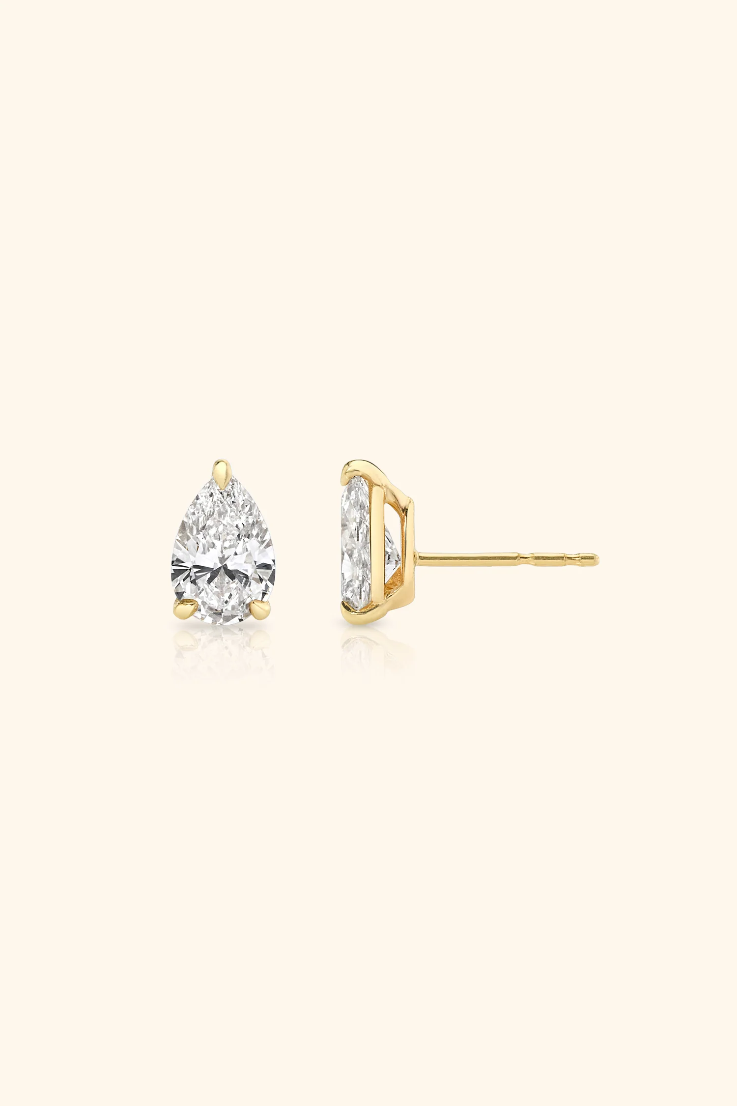 Classic Diamond Studs set with Pear Solitaire - Image 9