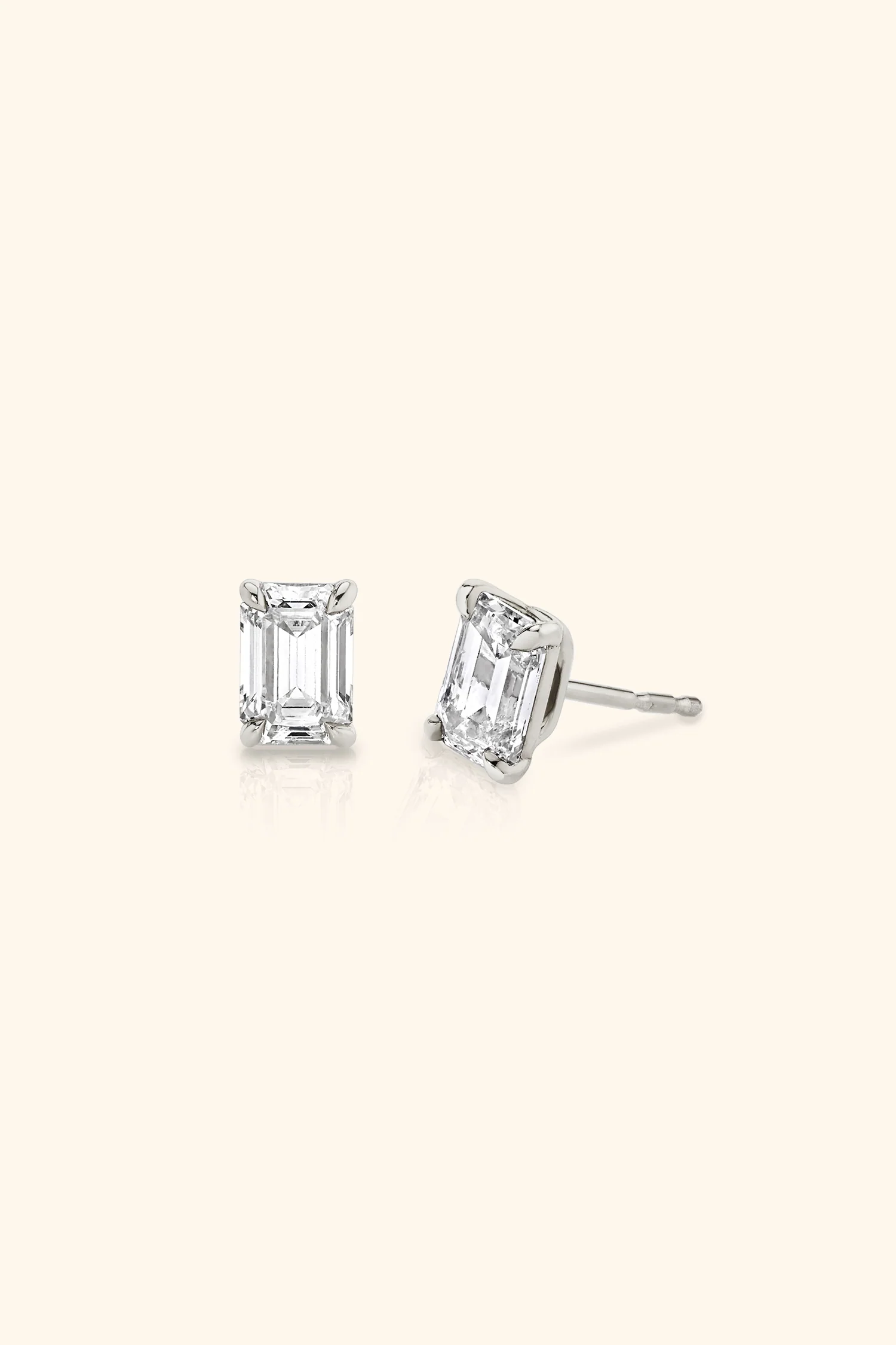Classic Diamond Studs set with an Emerald Solitaire - Image 10