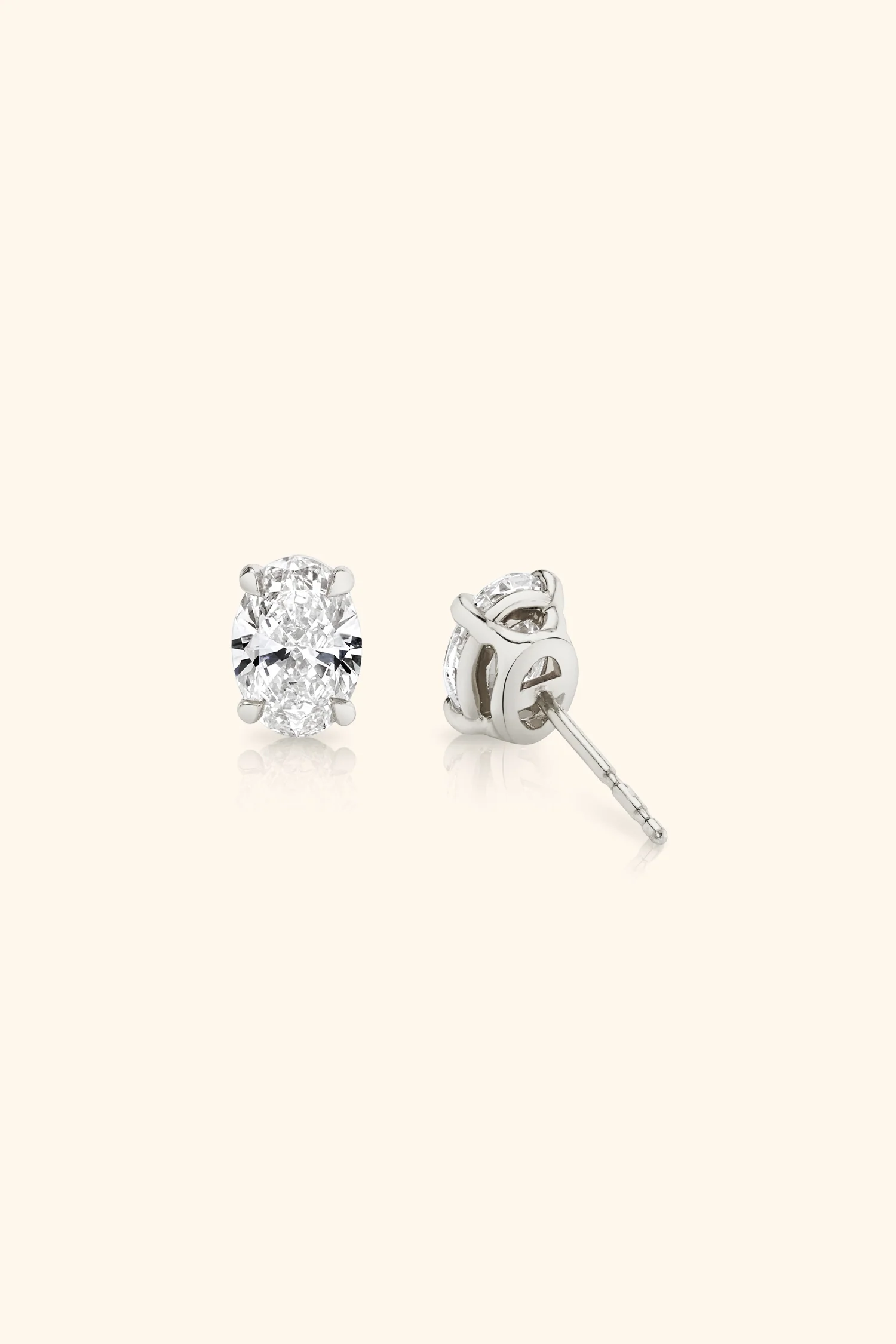 Classic Diamond Studs set with an Oval Solitaire - Image 4